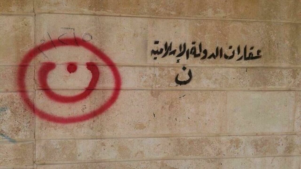 anti-Christian grafiti in Mosul, Iraq